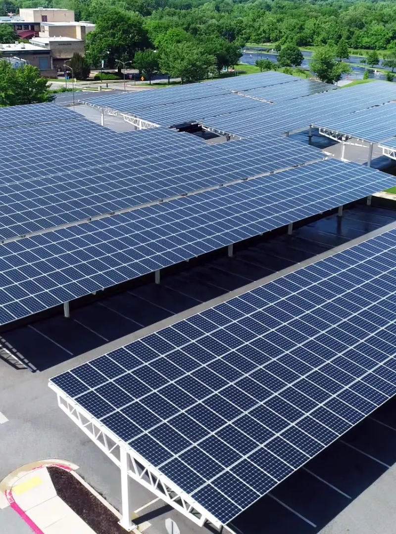 Rows of solar panels installed on a rooftop.